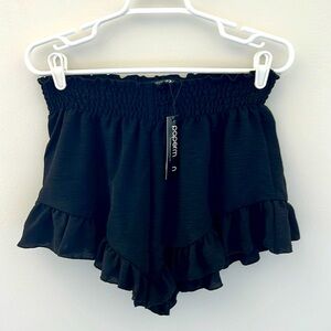 Women’s Papermoon black ruffle shorts. Size S